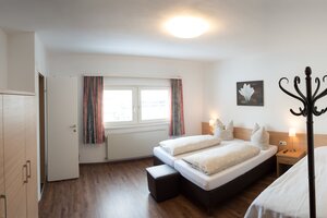 Appartment Brezel Schlafzimmer für 3 Personen mit eigenem Bad | © Kostner GmbH