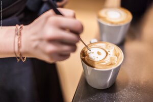 Barista Shooting Latte Art Cappucchino